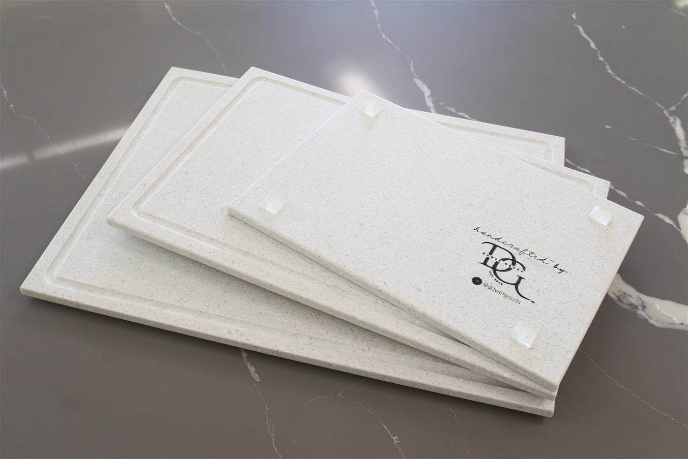 Stacked DAWER cutting boards handcrafted from upcycled countertop remnants